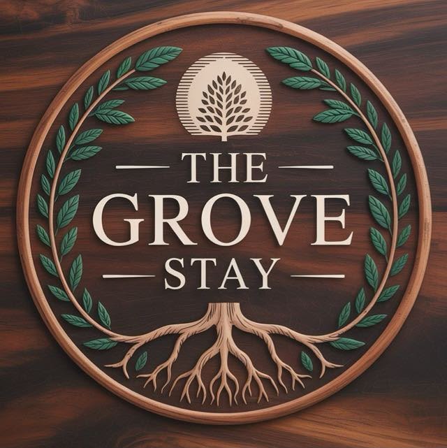 Grove Stay's previous logo — a generic carved wood emblem